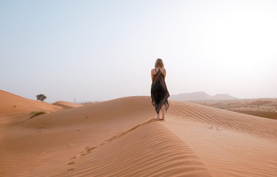 woman in a desert - it can actually be saver to travel solo 