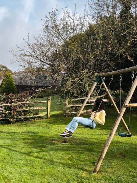 The swing set in the garden of the cottage